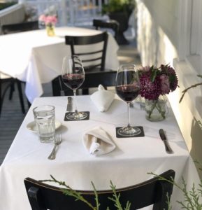 outdoor table with wine